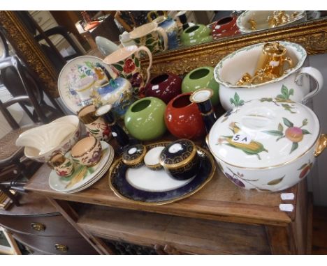 A POOLE POTTERY HAND PAINTED JUG, a Limoges dressing table set and similar ceramics