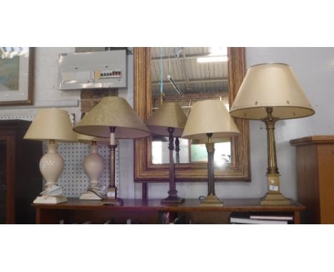 A BRASS CORINTHIAN COLUMN TABLE LAMP with shade and others simlar