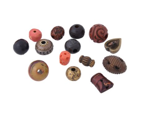 TA 5% Vat. λ A GROUP OF FOURTEEN JAPANESE OJIME BEADSEdo period, 19th centuryIncluding two beads decorated with lacquer, two 