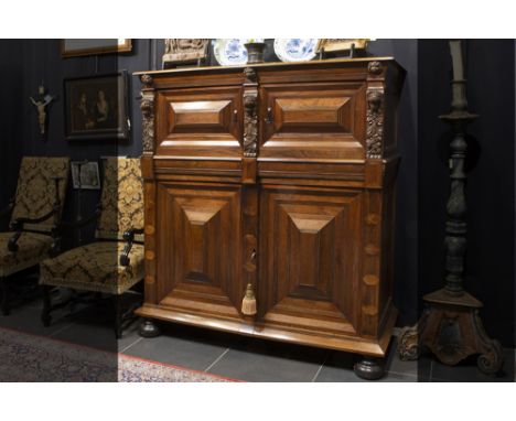 very good 17th Cent. cupboard with a beautiful sober baroque style architectural design in rose-wood, walnut and oak with fou