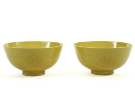 rare pair of 18th Cent. Chinese Qian Long period bowls in marked porcelain with imperial yellow glaze and underlying decor so