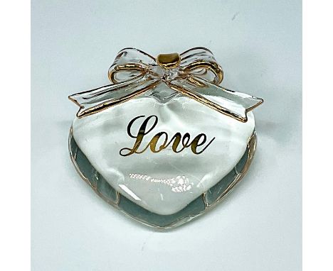 Glass heart with gold accents in a red silk box. Clear glass ribbon adorns the heart. This item has its original box with dim