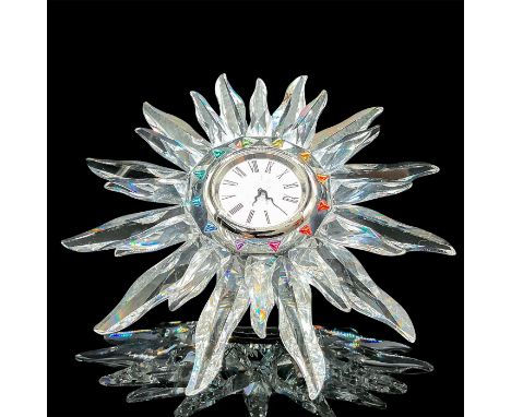 Part of the Exquisite Accents series. Lead crystal clock intricately detailed featuring a rainbow of colorful crystals framin