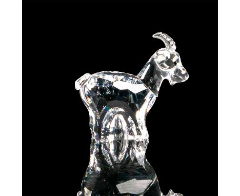 This goat is part of the ""Chinese Zodiacs"" collection. It is made of clear crystal including the antlers. The head is turne