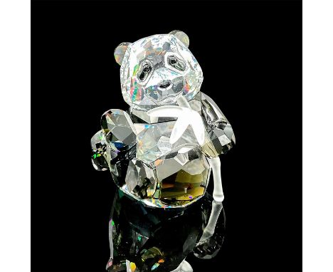 Features an adorable seated panda cub made of clear and jet black colored lead crystal, holding a bamboo stick. The companion