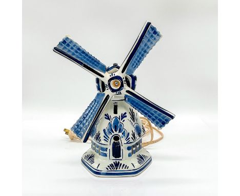 Decorative windmill lamp painted in the traditional blue on white porcelain. Dimensions: 8"L x 4.5"W x 9.5"HCountry of Origin