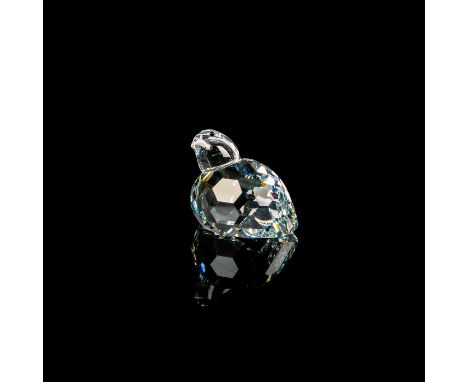 Partridge bird made out of clear crystal. The head is rotated to the side slightly on top of an oval body. Flat bottom with t