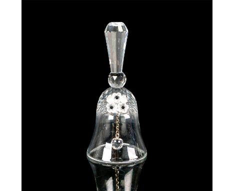 Small silver crystal bell with faceted handle, clapper, and three tiny daisies. Swarovski acid mark to base. This item has it