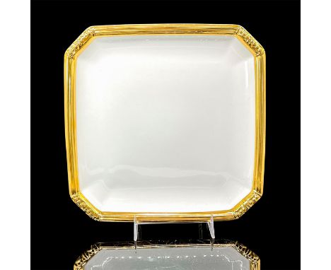 Glazed bone china with hand-painted gold 'Bangles' design rim.Katy Briscoe backstamp. This item has its original box. Issued: