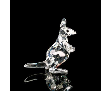 Faceted crystal figurine modeled as a mother kangaroo with her adorable baby popping its head out of her pouch. Swarovski aci