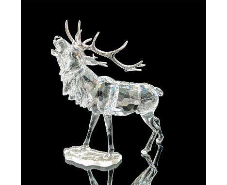 Part of the Rare Encounters series. Lead crystal figure with silver tone metal antlers and topaz crystal eyes, standing on a 