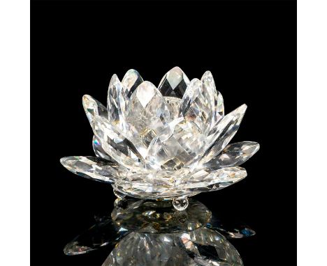 Small faceted crystal candlestick holder modeled as a blooming lotus flower. Swarovski acid mark to base. This item has its o