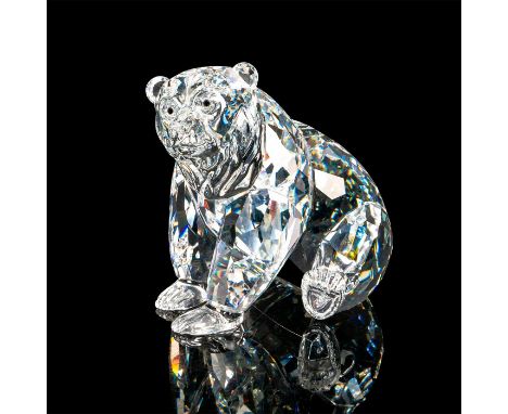 Grizzly bear sitting on hind legs with a clear faceted body and black crystal eyes. Swarovski backstamp. This item has its or