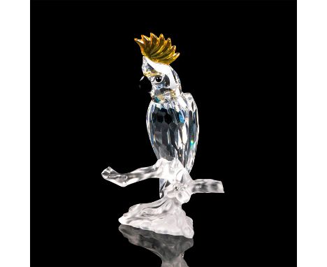 Faceted crystal figurine modeled as a yellow crested cockatoo perched on a frosted crystal branch. Swarovski acid mark to bas