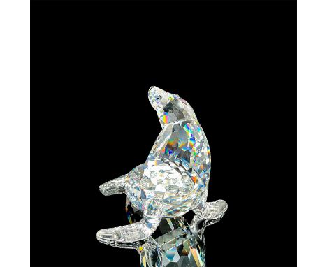 Part of the Aquatic Worlds collection. Lead clear crystal figure with jet crystal nose and tabac eyes. Swarovski etched backs