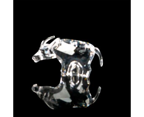 Miniature crystal figurine with crystal body, antlers, and tail standing on all four legs. Black crystals for the pupils. Par