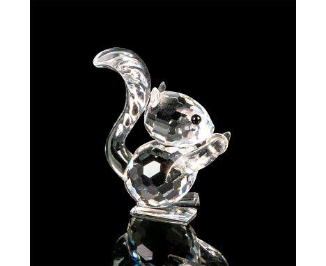 This squirrel is part of the ""Woodland Friends"" Collection. It is made of clear crystal with black crystal for the the eyes
