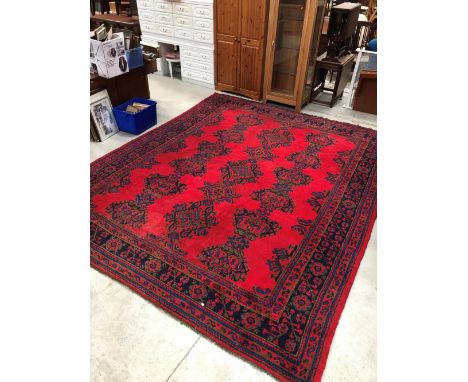 A large Turkish carpet square, approx 310cm x 385cm