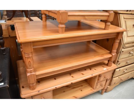 A modern pine coffee table, having shelf under, approx. 100 x 55cm