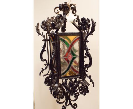 Large wrought iron and coloured glass hanging lantern light fitting, 30" long