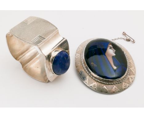 Large oval enamel portrait brooch depicting Madonna in a silver frame together with a Lapis set napkin ring 