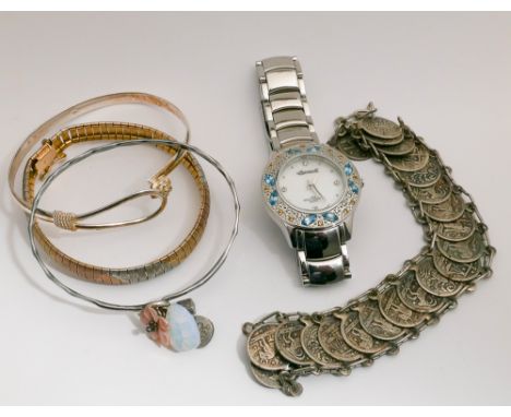 Three modern silver bangles, signs of the Zodiac bracelet and a modern ladies Ingersoll Quartz wristwatch set with gems 