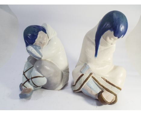 Two large Lladro figurines of a seated Eskimo boy and girl, 32cm tall - no sign of damage or restoration 