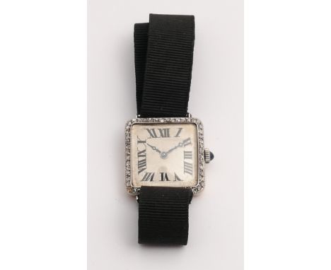 Art deco diamond set ladies cocktail watch, the square dial with Roman numerals and diamond bezel, white metal face, gold bac