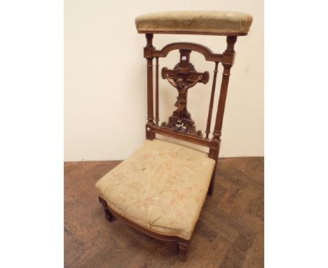 French walnut tapestry upholstered prayer chair with carved crucifix back 