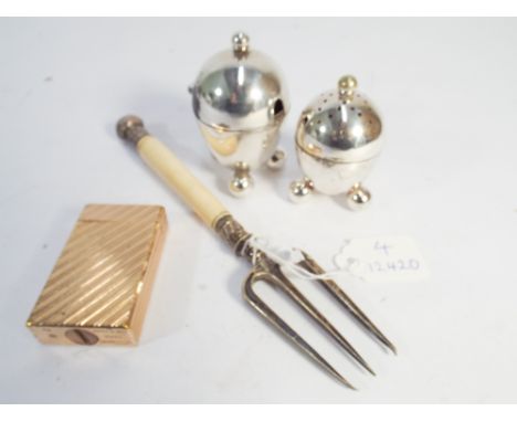 A DuPont gilt gold plated lighter, Victorian bread fork with silver finial and two condiments