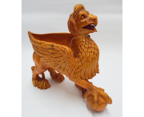 A Victorian Majolica Griffin style planter impressed makers mark G & ST for Gerbing and Stephan 38cms tall in mustard glaze, 
