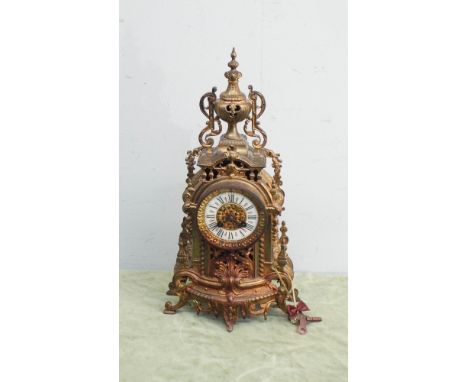 Decorative French striking mantel clock in gilt metal case 18" high 