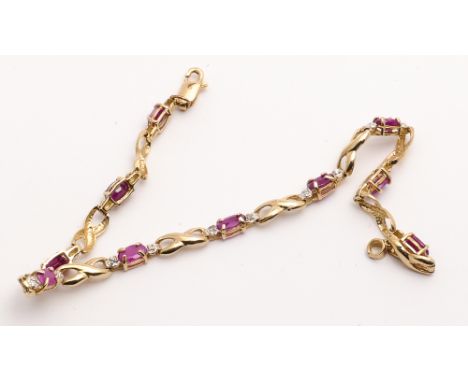 Ruby and diamond line bracelet set in 10k yellow gold.