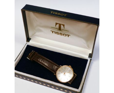 Gents vintage Tissot automatic gold wristwatch, circular dial with gold baton markers, leather strap. Boxed     watch is runn