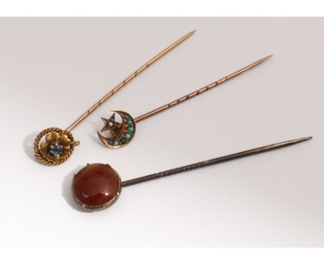 A group of 3 Victorian stick pins, to include turquoise set star & crescent stick pin, and an agate stick pin