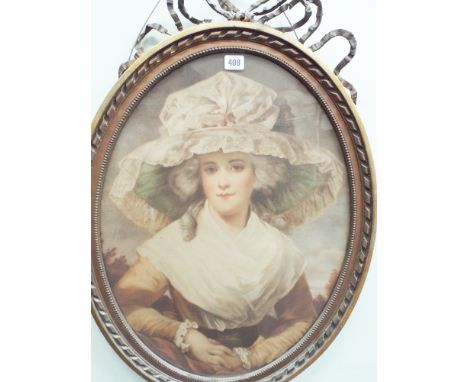 Late Victorian portrait print of a lady in an oval gilt frame with ribbon bow crusting frame measures 28" approx      some pl