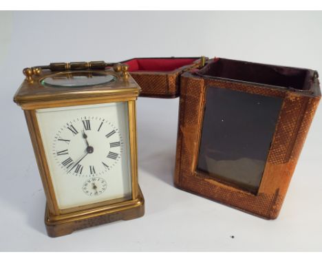 French brass carriage clock with brown leather travel case and key - has presentation inscription to Lilly Tyson, 1896-1905 f