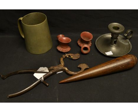 A pair of terracotta pipe bowls; an early 19th century lignum vitae sailor's fid; a pair of early 19th century sugar cutters;