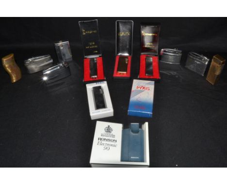 Cigarette Lighters - a chrome Ronson Varaflame; a chrome engine turned Mosda Streamline; a Gas Brother-Lite; others;