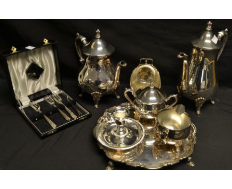 An EPNS four piece tea and coffee service, with acanthus capped scroll handles, knurl feet; a George III style shaped circula