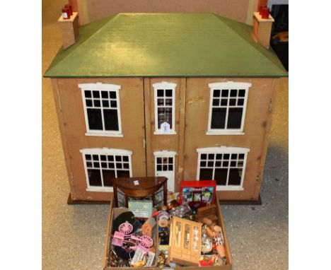 A mid 20th century scratch built two storey doll's house, Georgian style, battery operated lighting, part fitted interior 