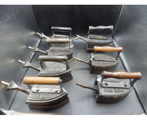 4 Salters gas irons incl no.4 together with 3 A Kendrick &amp; sons gas irons incl Aurora enamel model with stand
