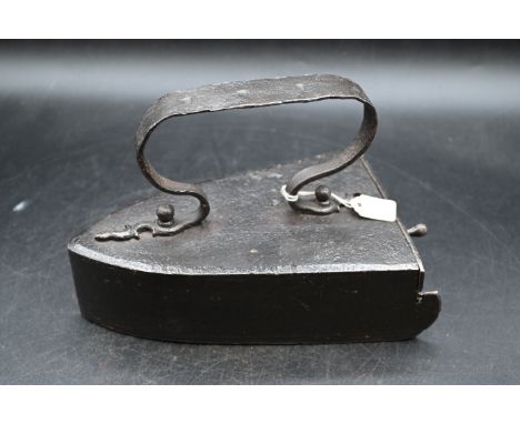 Vintage box iron with metal handle and slug
