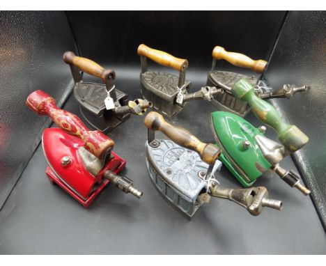 6 Beatrice gas irons to incl 3 x No.1, 1 x No.1 enamel and 2 Rex enamel irons in red and green both with trivets