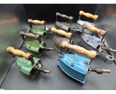 8 assorted OK gas irons etc, 6 enamel, 4 with trivets