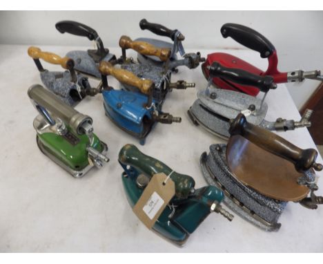 10 assorted enamel gas irons to include Fletcher Russell Laurel with trivet, MB, KB Ltd, W L Co Ltd, Brostrom, Universe, Supe