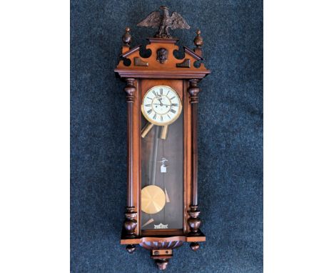 GUSTAV BECKER; a late 19th century rosewood and walnut cased Vienna type wall clock, the enamel dial set with Roman numerals 