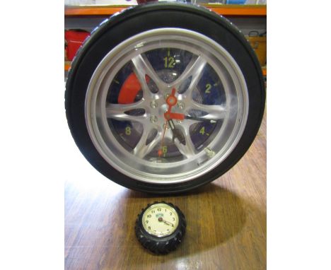 mini John Deere tyre clock and a larger tyre clock&nbsp;