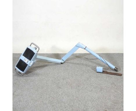 A mid 20th century dentist's light, on an adjustable base, 163cm long
