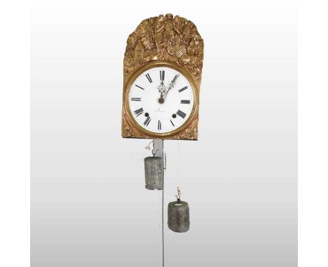 An early 20th century French comtoise wall clock, the enamel dial signed à Jucé, having a pressed brass surround and twin wei